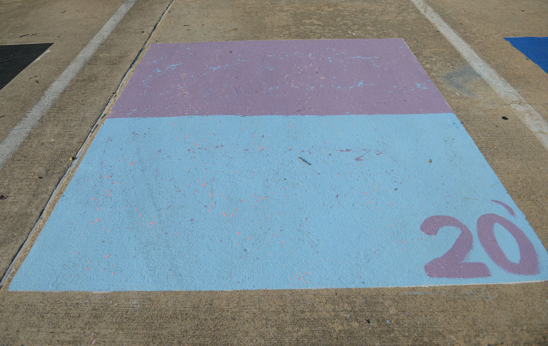 A&M Consolidated HS painted parking spots